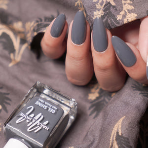Nails & More shade 50 Dark Grey β elegant dark grey gel-shine nail polish with smooth coverage, glossy long-wear finish, vegan and non-toxic formula.
