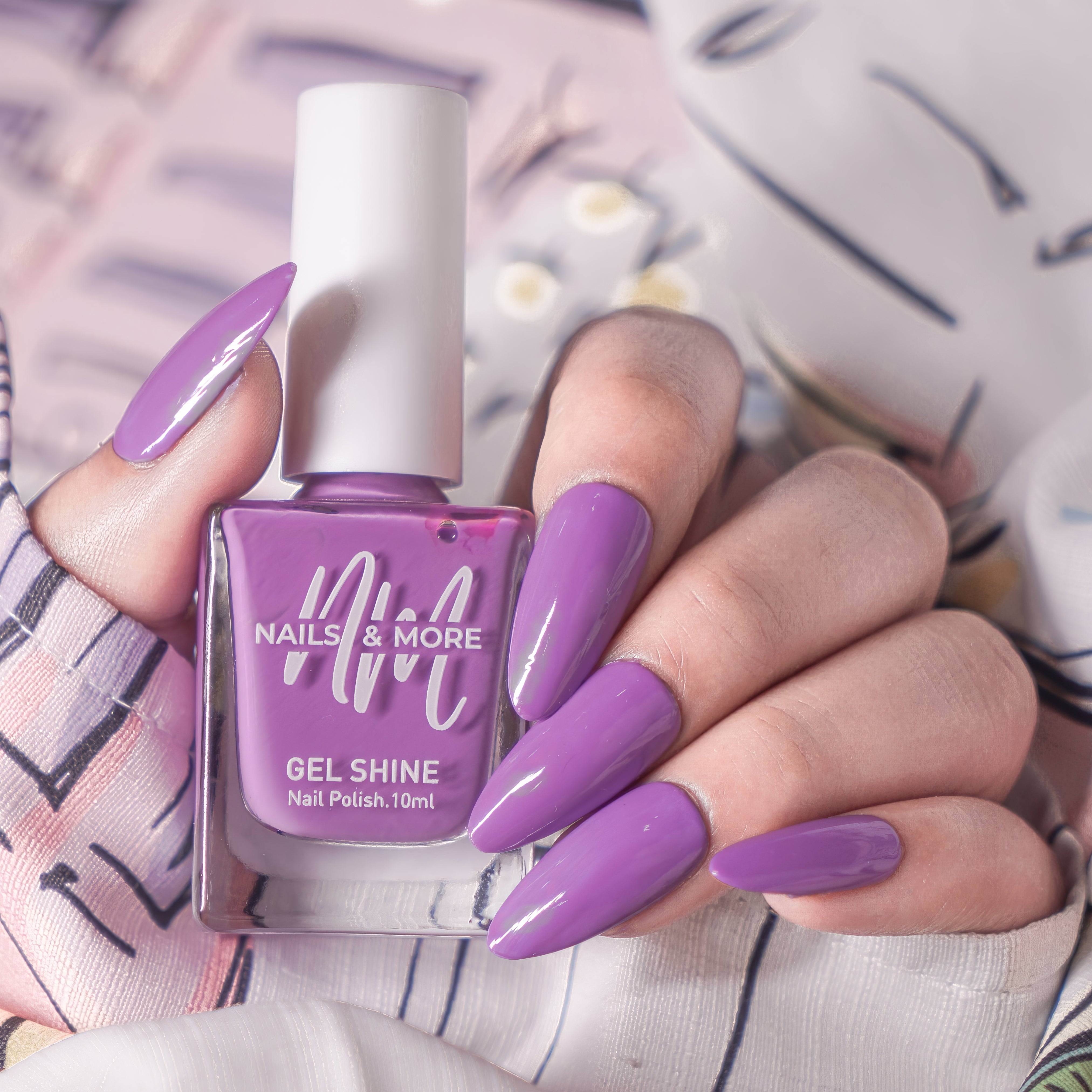 Nails & More Orchid shade – elegant orchid-purple gel-shine nail polish with rich pigmentation, smooth glossy finish, long-lasting wear, vegan and non-toxic formula.