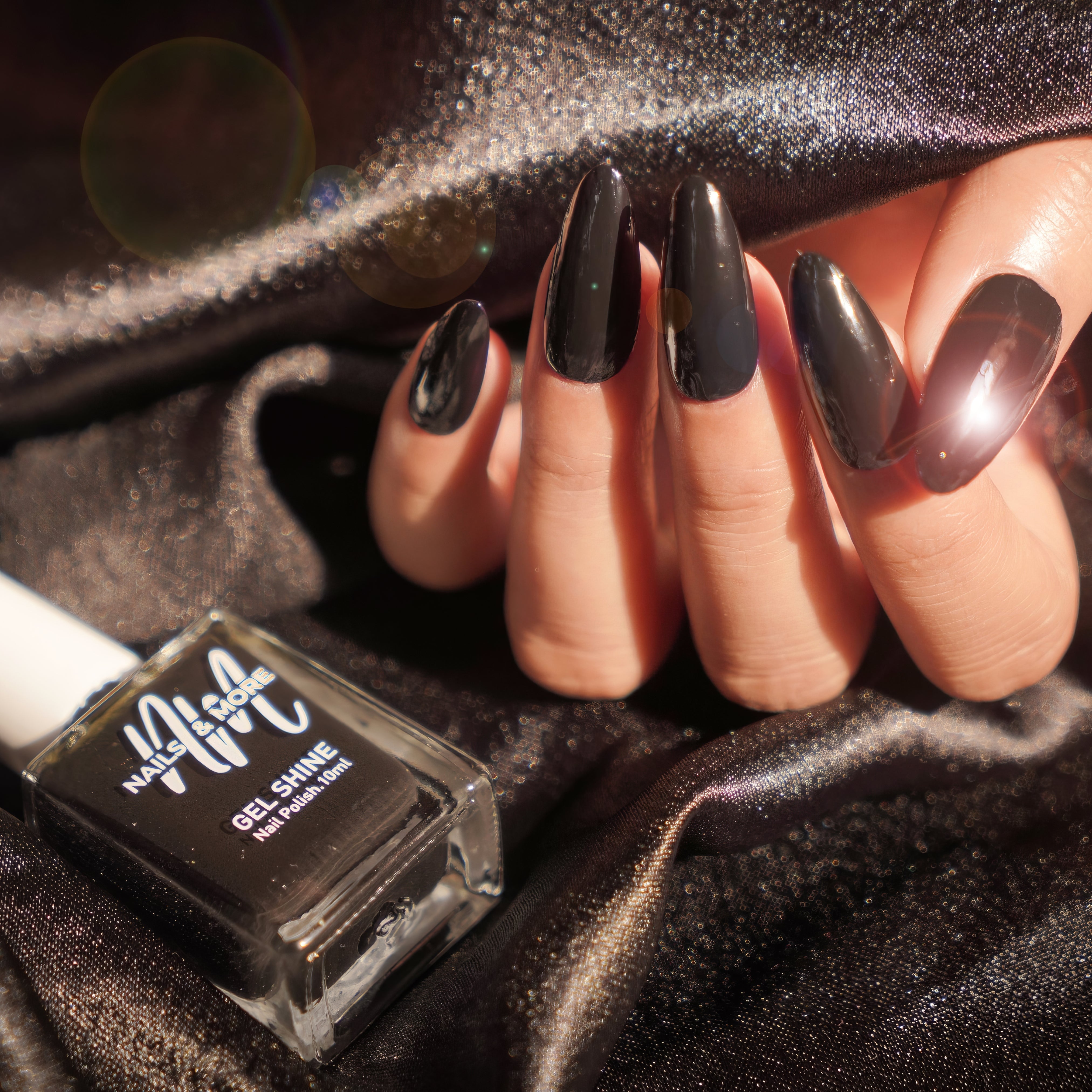 Nails & More shade 51 Black – deep jet-black gel-shine nail polish with rich pigmentation, high glossy finish, long-lasting, vegan and non-toxic formula.